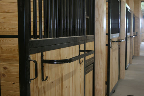 Blanket bar mounted on stall door